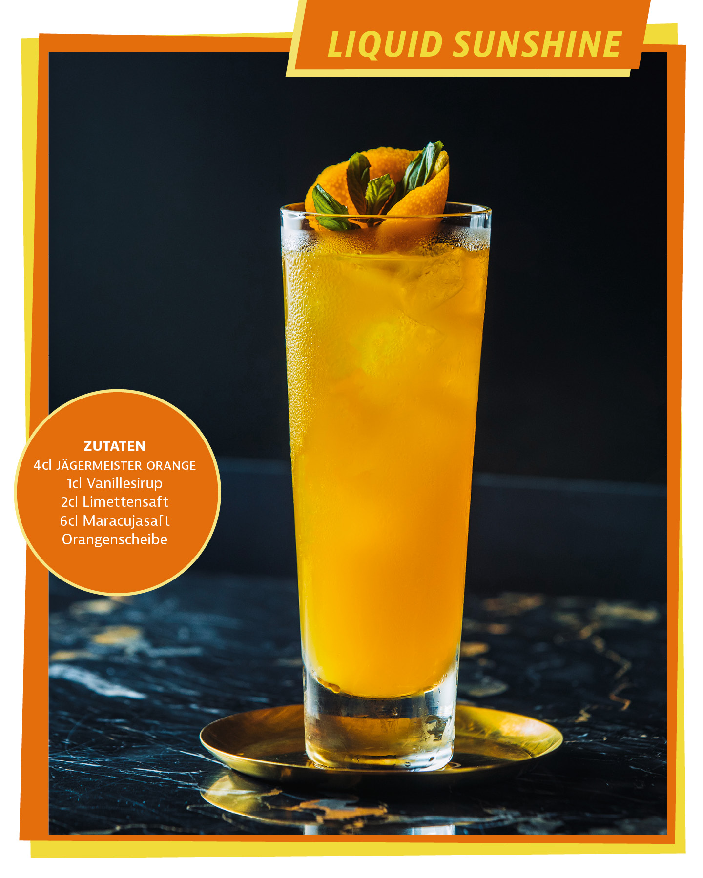 LIQUID SUNSHINE Drink Glas mit oranger Flüssigkeit und Deko